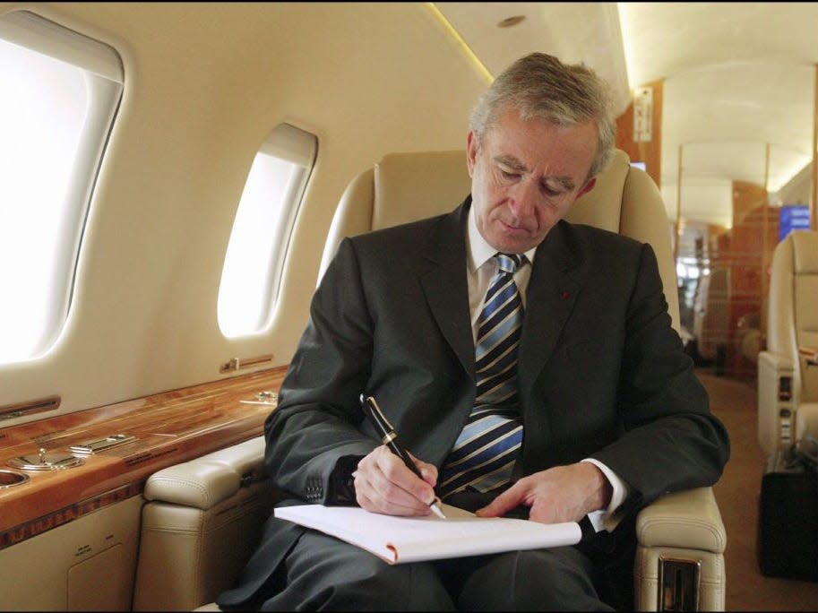 LVMH CEO Bernard Arnault on board his private jet between Beijing and Shanghai. in Shanghai, China on October 11, 2004.