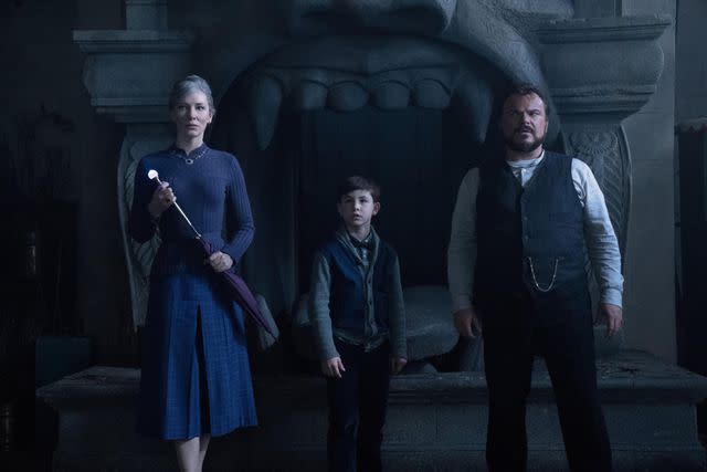 <p>Universal/Moviestore/Shutterstock</p> Cate Blanchett, Owen Vaccaro, and Jack Black in 'The House with a Clock in Its Walls'.