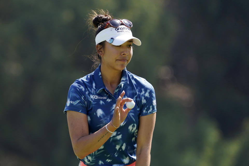 Alison Lee acknowledges the crowd after putting out on the eighth hole during the first round of the MEDIHEAL Championship golf tournament Thursday, Oct. 6, 2022, in Somis, Calif. (AP Photo/Mark J. Terrill)