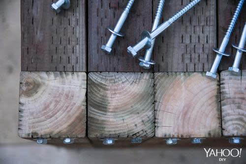 Wood table corner with screws and washers