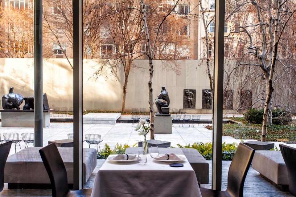 Indoor restaurant seating by a window.