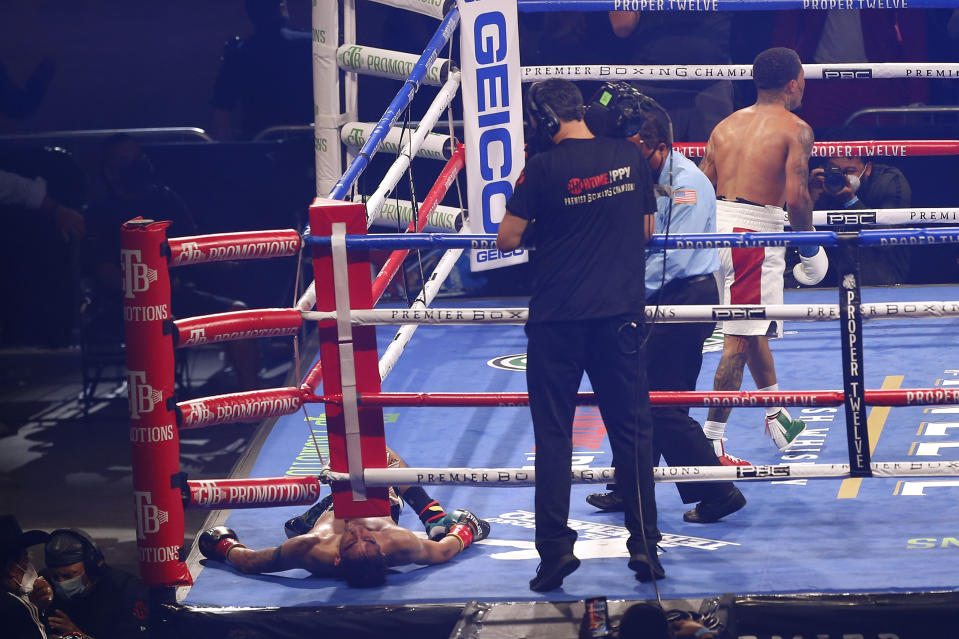 Gervonta Davis walks away after knocking out Leo Santa Cruz during the sixth round of a boxing bout Saturday, Oct. 31, 2020, in San Antonio. (AP Photo/Ronald Cortes)