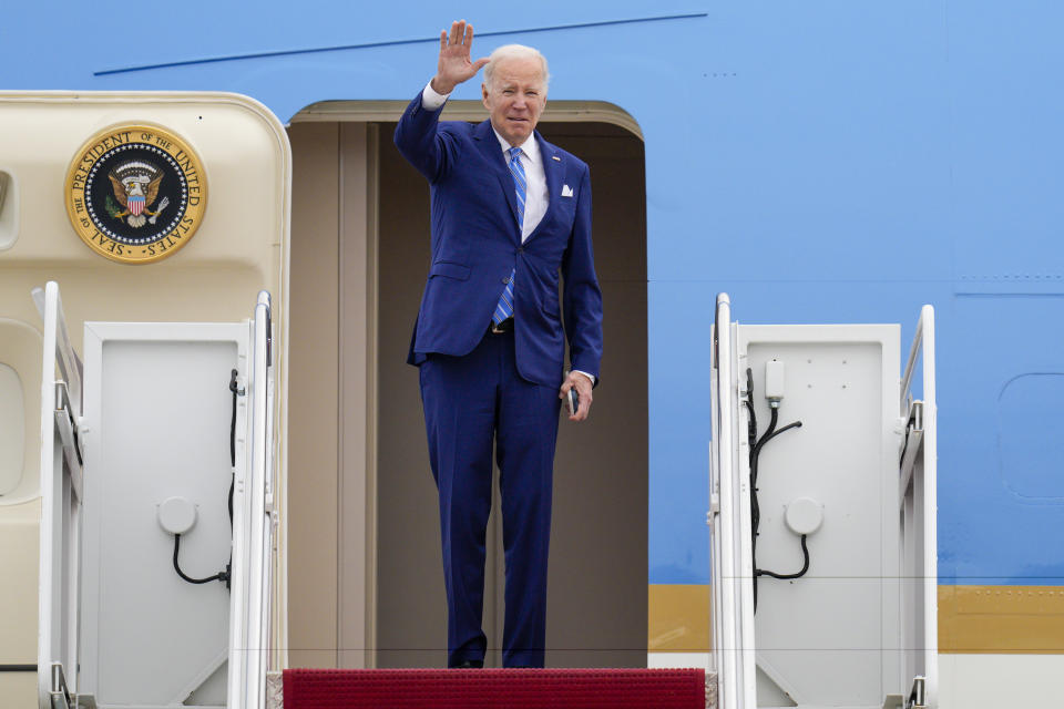 President Joe Biden waves as he boards Air Force One at Andrews Air Force Base, Md., Thursday, Feb. 9, 2023, en route to Florida. (AP Photo/Jess Rapfogel)