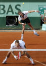 Belarus Max Mirnyi (L) and Canada's Daniel Nestor (R) hit a return to US Bob Bryan and US Mike Bryan during Men's Doubles final tennis match of the French Open tennis tournament at the Roland Garros stadium, on June 9, 2012 in Paris. AFP PHOTO / THOMAS COEXTHOMAS COEX/AFP/GettyImages