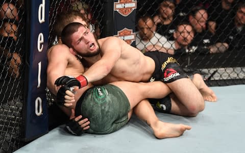 Scenes of utter mayhem here in Sin City as the biggest mixed martial arts event in history ended in a mass brawl between the teams of the two headline contenders, combat sports star Conor McGregor, of Ireland, and Dagestan's Khabib Nurmagomedov, who retained his Ultimate Fighting Championship lightweight crown by submitting his rival in the fourth round.