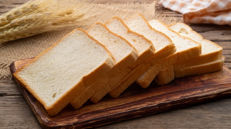 sliced bread on wooden board