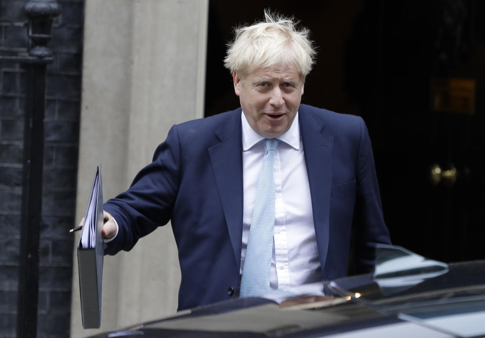 Britain's Prime Minister Boris Johnson leaves Downing Street to attend Parliament in London, Thursday, Oct. 3, 2019. The U.K. offered the European Union a proposed last-minute Brexit deal on Wednesday that it said represents a realistic compromise for both sides, as British Prime Minister Boris Johnson urged the bloc to hold "rapid negotiations towards a solution" after years of wrangling. (AP Photo/Kirsty Wigglesworth)