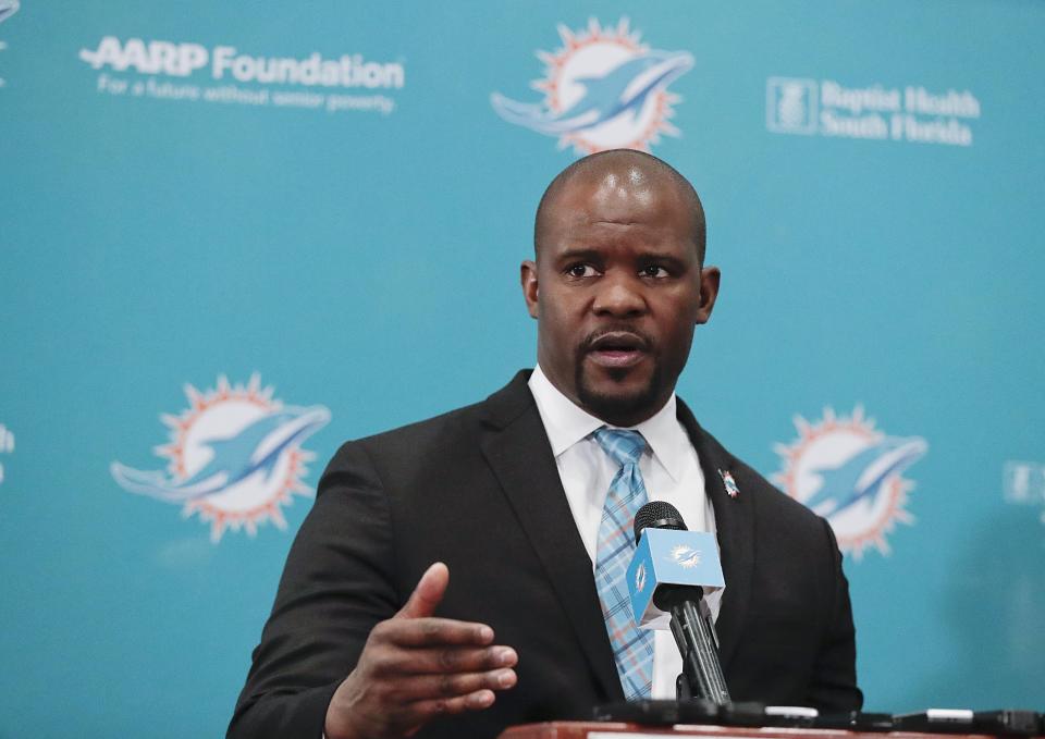 The new Miami Dolphins head coach Brian Flores speaks during a news conference on Monday, Feb. 4, 2019, in Davie, Fla. Hours after his team won the Super Bowl, New England Patriots linebackers coach Flores has been hired as head coach of the Miami Dolphins. (AP Photo/Brynn Anderson)
