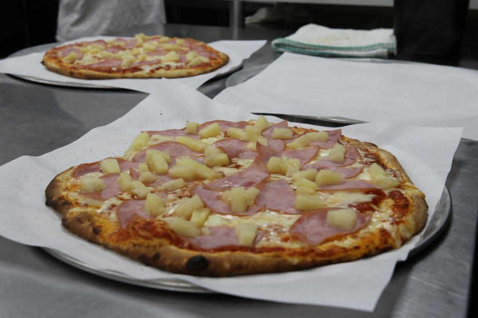 A Hawaiian pizza is ready to devour, April 19, 2024 at Guadalupe Mountain Brewing Company.