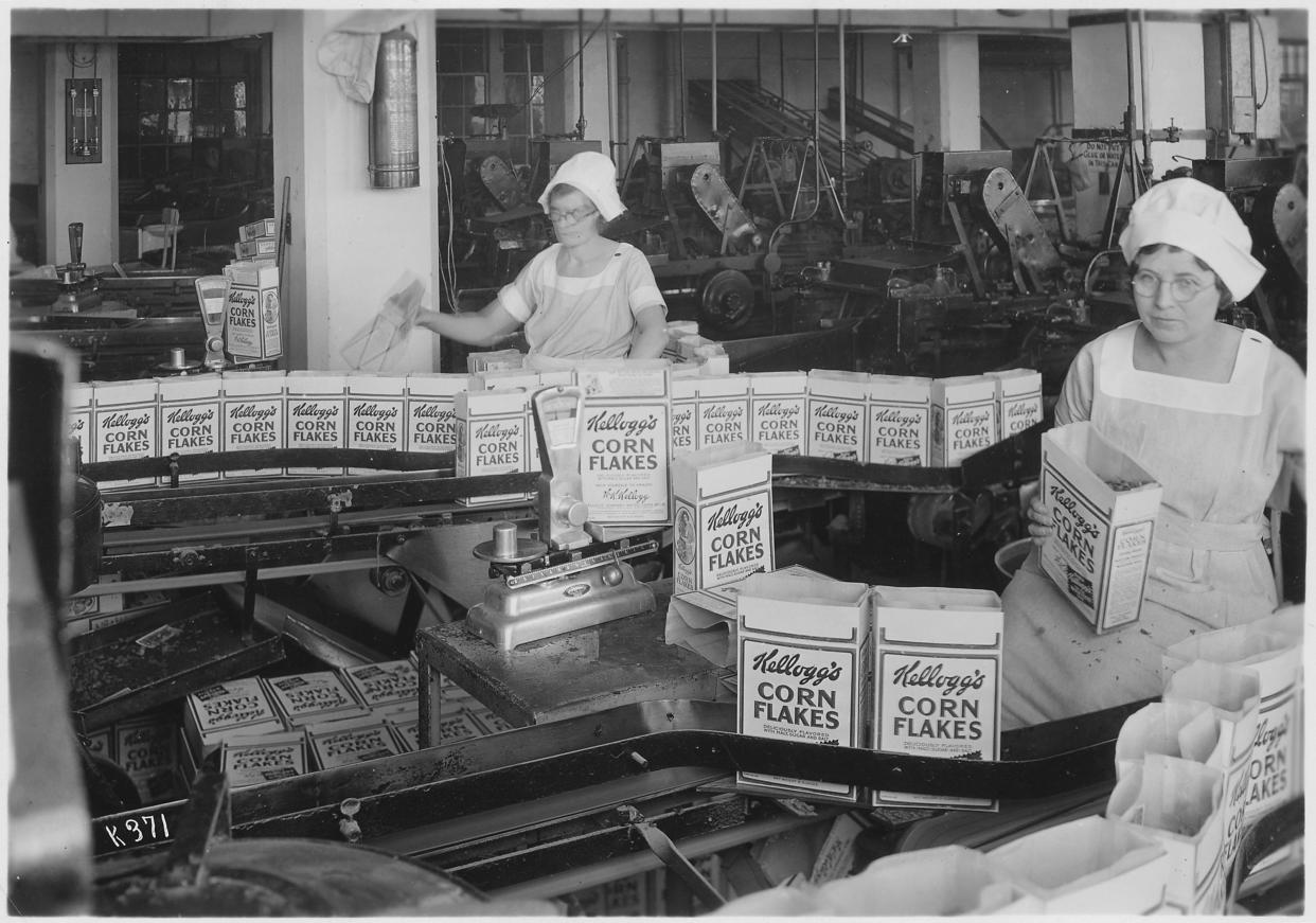 This 1934 image shows women inspecting filled boxes of cereal before boxes go to sealer.