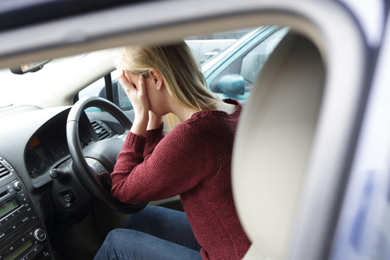 Menopausal woman feeling anxious when driving. (Getty Images)