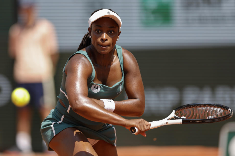 Sloane Stephens of the U.S. plays a shot against Karolina Pliskova of the Czech Republic during their first round match of the French Open tennis tournament at the Roland Garros stadium in Paris, Monday, May 29, 2023. (AP Photo/Jean-Francois Badias)