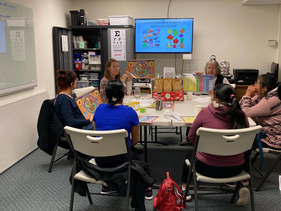 KIAC staff member Annika Turner provides interpretation during Diabetes Class with West Sound Free Clinic volunteers.