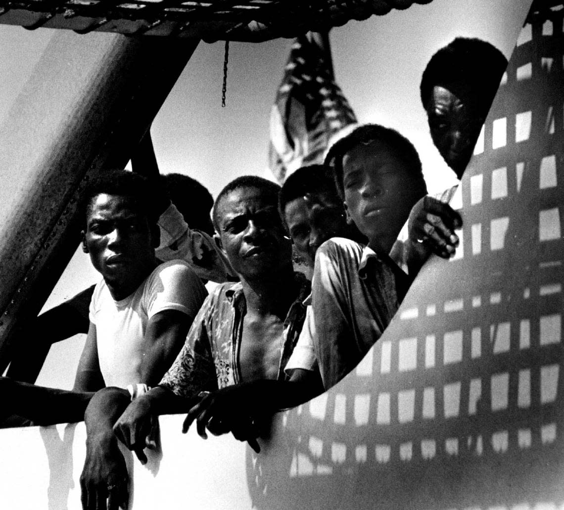 Haitian refugees wait aboard the Coast Guard cutter Durable after they were rescued from three leaky boats more than 100 miles south of Miami. About 239 Haitians were packed onto a 50-foot sailboat headed for the Florida coast when they were discovered by the Coast Guard.