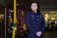 Fire Engine Captain Joe Peña of Los Angeles County Fire Department - Station 106 poses for a photo at his station Friday, Feb. 26, 2021, in Rancho Palos Verdes, Calif, a suburb of Los Angeles. He was among first responders at the scene of a vehicle crash involving Tiger Woods on Tuesday. (AP Photo/Ashley Landis)