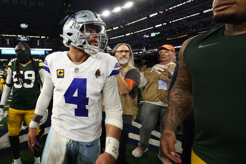 Dallas Cowboys quarterback Dak Prescott (4) walks off the field against the Green Bay Packers after the 2024 NFC wild card game at AT&T Stadium.