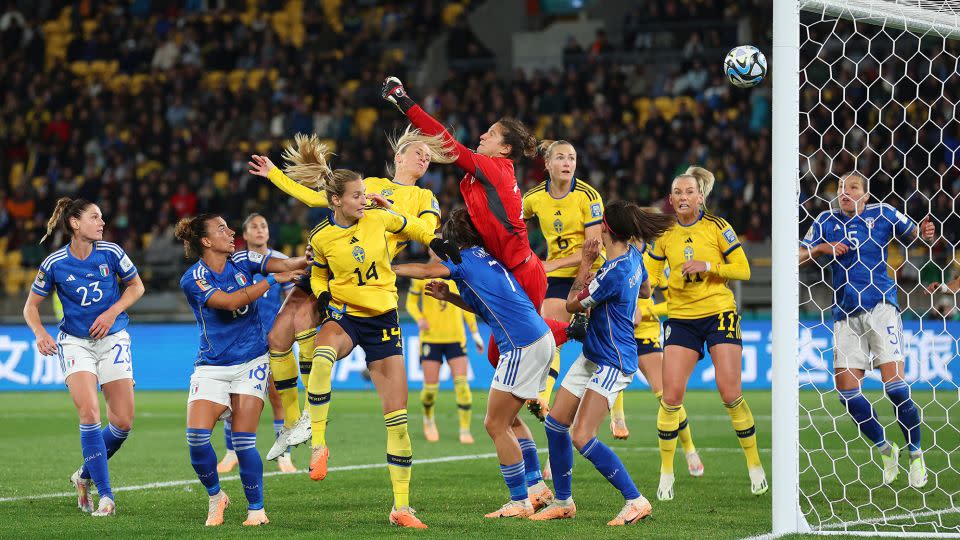 Amanda Ilestedt heads to score Sweden's first goal against Italy. - Catherine Ivill/Getty Images