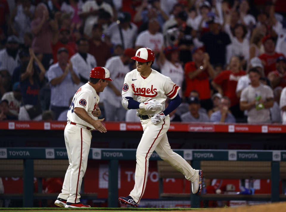 ANAHEIM, CALIFORNIA - AUGUST 31:  Shohei Ohtani #17 of the Los Angeles Angels runs after hitting a three-run home run against the New York Yankees in the sixth inning at Angel Stadium of Anaheim on August 31, 2022 in Anaheim, California. (Photo by Ronald Martinez/Getty Images)