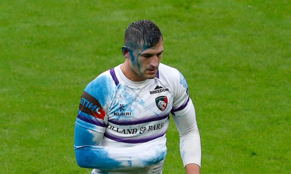 Leicester’s Jonny May leaves the field after injuring his arm against Northampton.