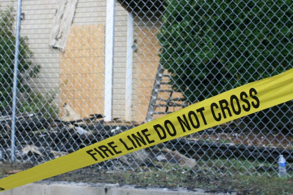 Ash and debris pile outside of the burned apartment building at Providence Pointe’s complex.