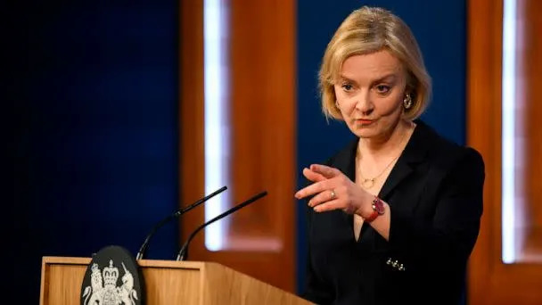 PHOTO: Britain's Prime Minister Liz Truss attends a press conference in the Downing Street Briefing Room in central London, on Oct. 14, 2022. (Daniel Leal/AP)