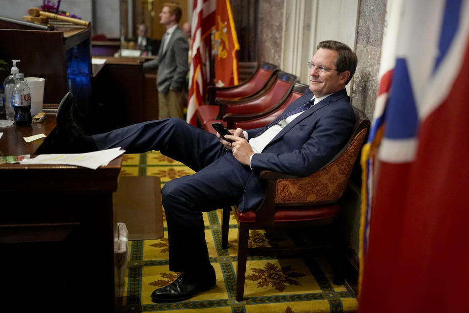 House Speaker Cameron Sexton, R-Crossville, relaxes on the dais in the House chamber during a recess of a legislative session, Thursday, April 25, 2024, in Nashville, Tenn. (AP Photo/George Walker IV)