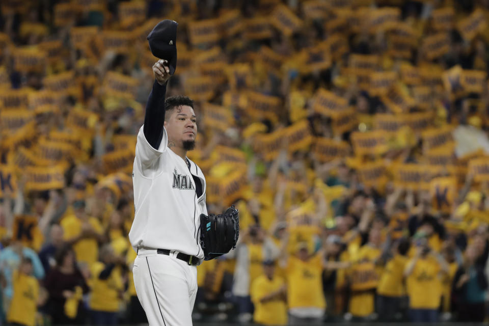 FILE - With the "King's Court" cheering section behind him, Seattle Mariners starting pitcher Félix Hernández tips his cap as he takes the mound for the team's baseball game against the Oakland Athletics, Sept. 26, 2019, in Seattle. Ichiro Suzuki headlines the group of players who are eligible for Hall of Fame voting a year from now. That ballot is also expected to include Cy Young Award winners CC Sabathia and Hernández — and the final chance for reliever Billy Wagner, who fell five votes short this time.(AP Photo/Ted S. Warren, File)