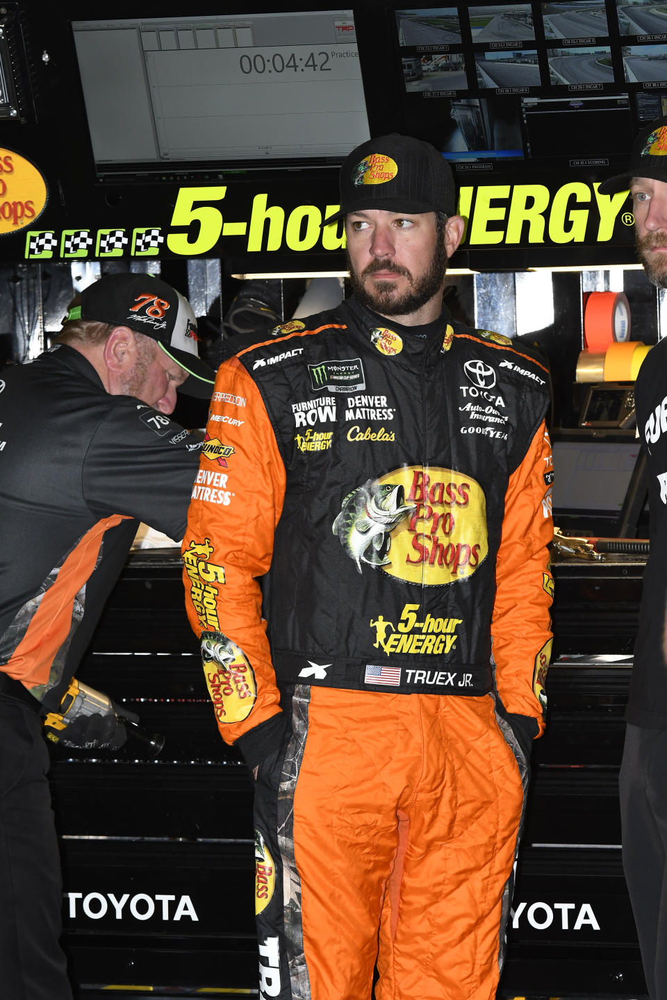 NASCAR Monster Energy Cup Series driver Martin Truex, Jr. stands in the garage area before practice for Sunday's race at Texas Motor Speedway, Saturday, Nov. 3, 2018, in Fort Worth, Texas. (AP Photo/Larry Papke)