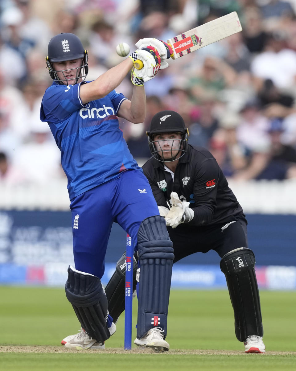 England's Harry Brook plays a shot off the bowling of New Zealand's Rachin Ravindra during the One Day International cricket match between England and New Zealand at Lord's cricket ground in London, Friday, Sept. 15, 2023. (AP Photo/Kirsty Wigglesworth)