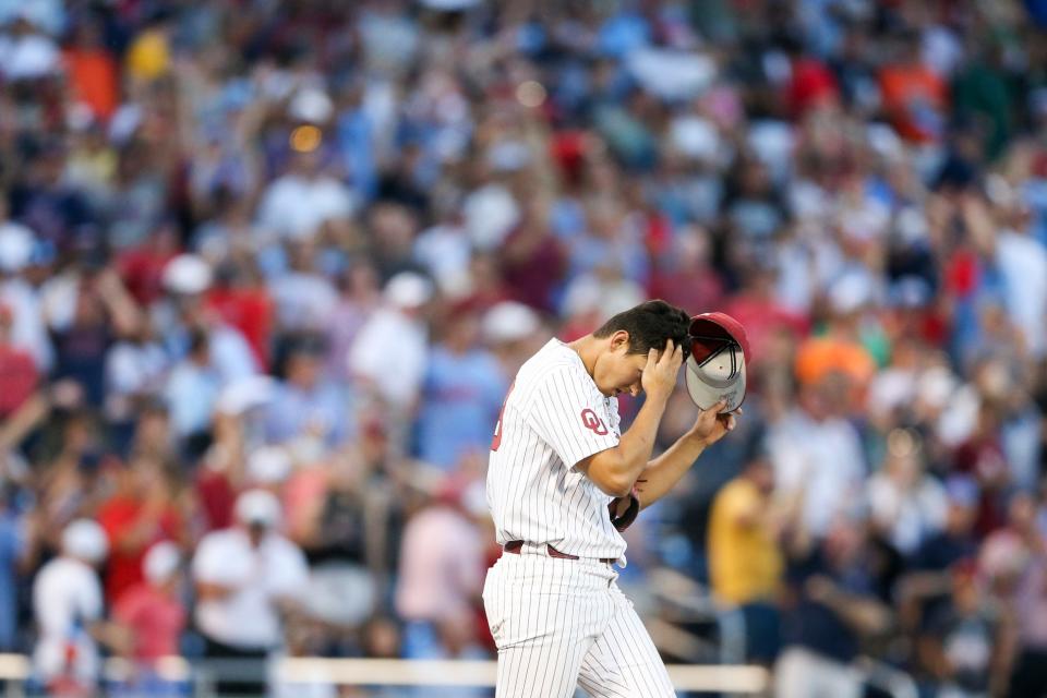 OU pitcher Chazz Martinez reacts after giving up three consecutive home runs to Mississippi during Game 1.