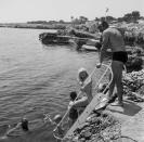 <p>Sean Connery prepares to take a dip in the ocean. </p>