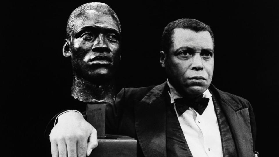 PHOTO: James Earl Jones as Paul Robeson with his bust at Her Majesty's Theatre in London, 1978. (Hulton-Deutsch Collection/Corbis via Getty Images)