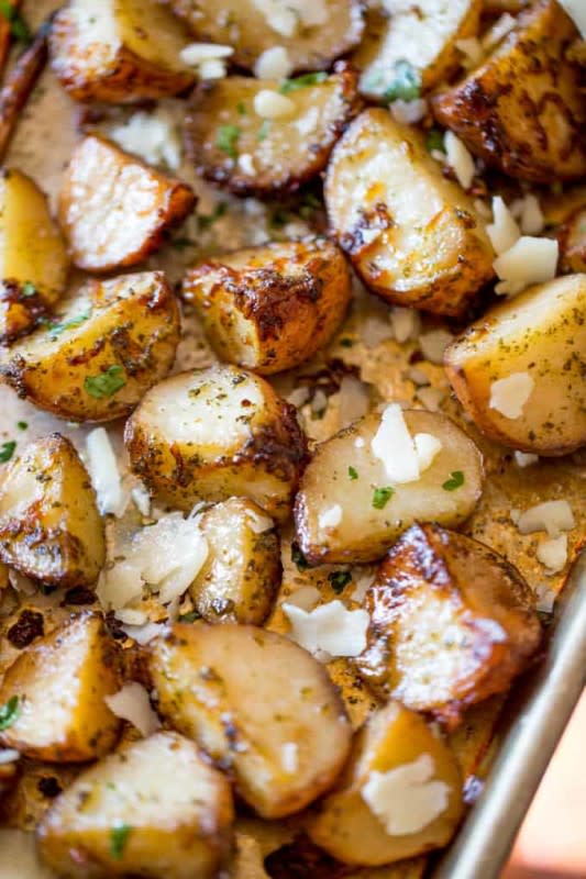 <p>Dinner then Dessert</p><p>Parmesan pesto roasted potatoes are ready for roasting in minutes with red potatoes, basil pesto, olive oil and parmesan cheese.</p><p><strong>Get the recipe: <a href="https://dinnerthendessert.com/parmesan-pesto-roasted-potatoes/" rel="nofollow noopener" target="_blank" data-ylk="slk:Parmesan Pesto Roasted Red Potatoes;elm:context_link;itc:0;sec:content-canvas" class="link ">Parmesan Pesto Roasted Red Potatoes</a></strong></p><p><strong>Related: <a href="https://parade.com/1191538/christinehadden/pesto-recipes/" rel="nofollow noopener" target="_blank" data-ylk="slk:40 Creative and Easy Pesto Recipes;elm:context_link;itc:0;sec:content-canvas" class="link ">40 Creative and Easy Pesto Recipes</a></strong></p>
