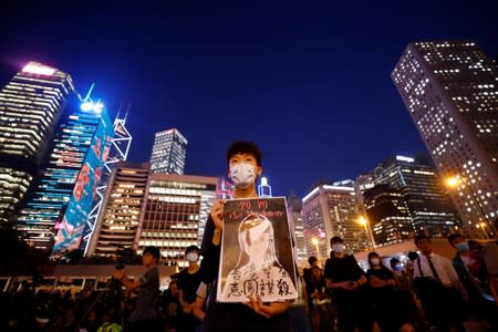 Students stage a rally to call for political reforms outside City Hall in Hong Kong