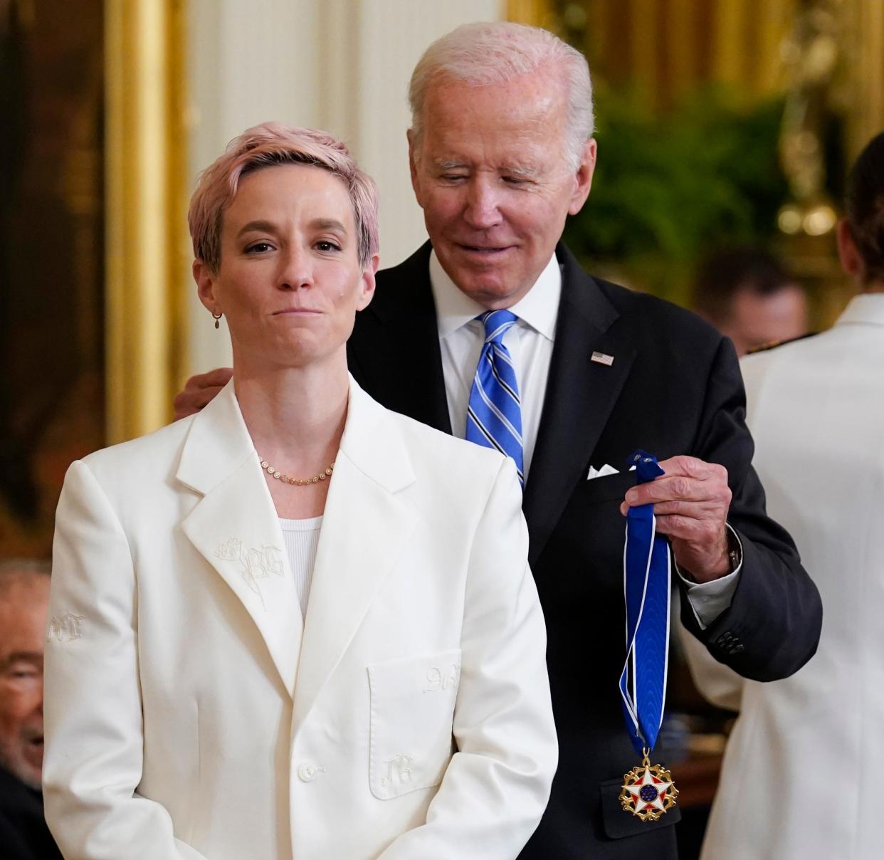 President Joe Biden awards the nation's highest civilian honor, the Presidential Medal of Freedom, to Megan Rapinoe at the White House in Washington, Thursday, July 7, 2022.