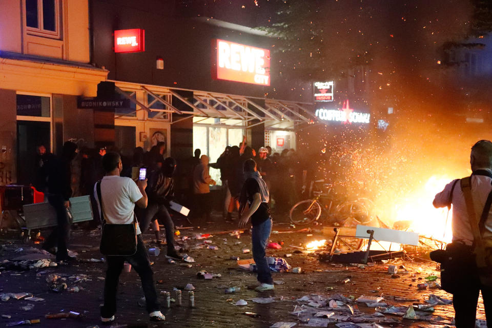 <p>Barricades burn as protesters clash with riot police during the protests at the G20 summit in Hamburg, Germany, July 7, 2017. (Fabrizio Bensch/Reuters) </p>