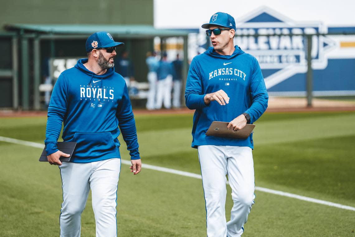 Royals major league pitching strategist Andy Ferguson, left, chats with assistant pitching coach Zach Bove before a recent game.