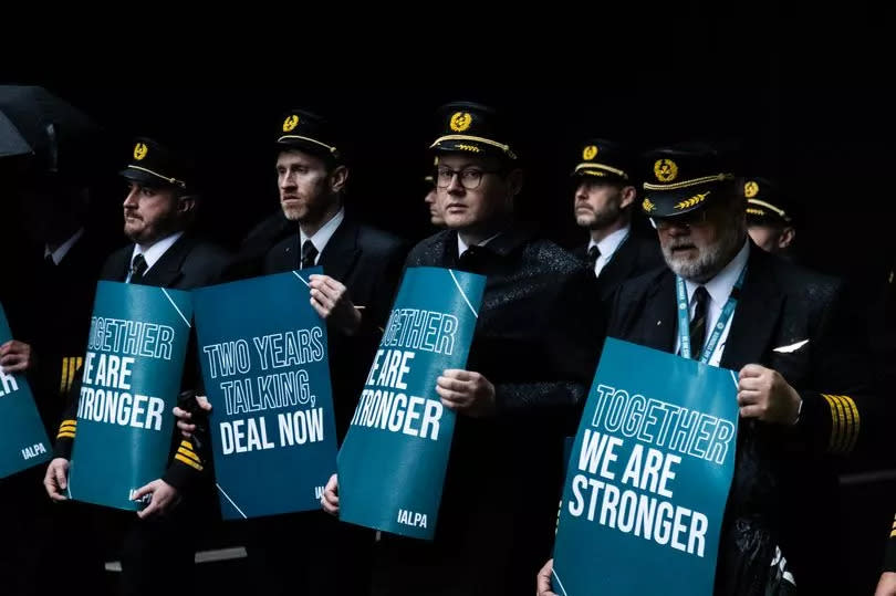 Aer Lingus pilots march around Dublin Airport as they begin their eight-hour strike on Saturday