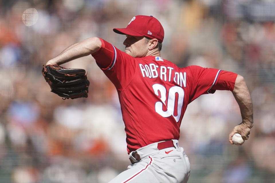 FILE - Philadelphia Phillies' David Robertson pitches during the team's baseball game against the San Francisco Giants in San Francisco, Sept. 4, 2022. The active New York Mets took two more steps toward restocking their pitching staff Friday night, Dec. 9, finalizing contracts with free agents José Quintana and Robertson. (AP Photo/Jeff Chiu, File)