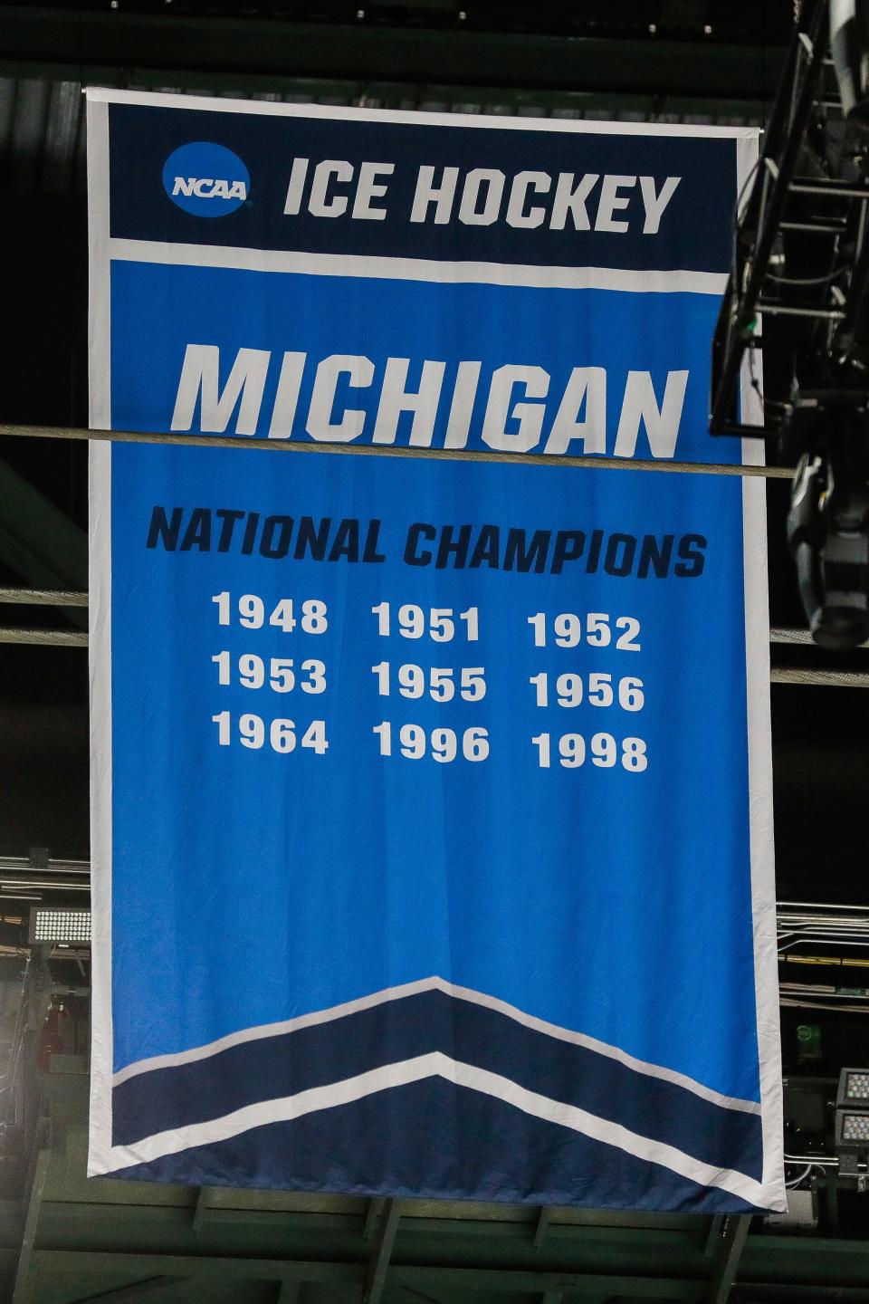 A Michigan national championships banner at Xcel Energy Center in St. Paul, Minn. on Wednesday, April 10, 2024.