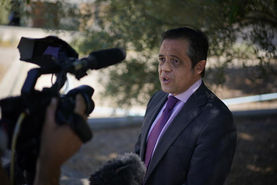 Lawyer Javier Villalba speaks briefly with journalists on leaving the Brians 2 penitentiary center in Sant Esteve Sesrovires, near Barcelona, northeast Spain, Friday, June 25, 2021. A judge in northeastern Spain has ordered an autopsy for John McAfee, creator of the McAfee antivirus software, a gun-loving antivirus pioneer, cryptocurrency promoter and occasional politician who died in a cell pending extradition to the United States for allegedly evading millions in unpaid taxes. McAfee's Spanish lawyer, Javier Villalba, said the entrepreneur's death had come as a surprise to his wife and other relatives, since McAfee "had not said goodbye." (AP Photo/Joan Mateu)