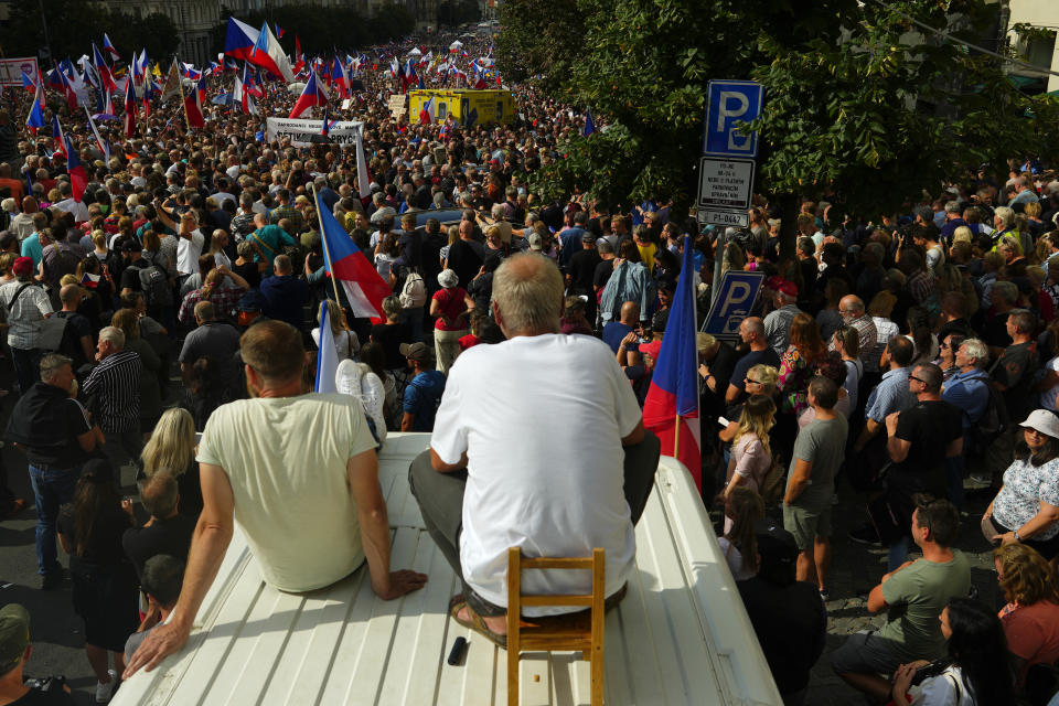 Thousands of demonstrators gather to protest against the government at the Vencesla's Square in Prague, Czech Republic, Saturday, Sept. 3, 2022. (AP Photo/Petr David Josek)