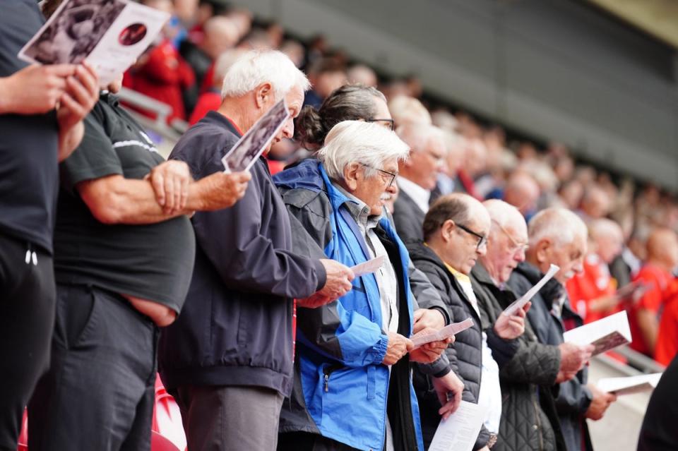 Fans pay their respects during the remembrance service for former Wales fly-half Phil Bennett (David Davies/PA) (PA Wire)