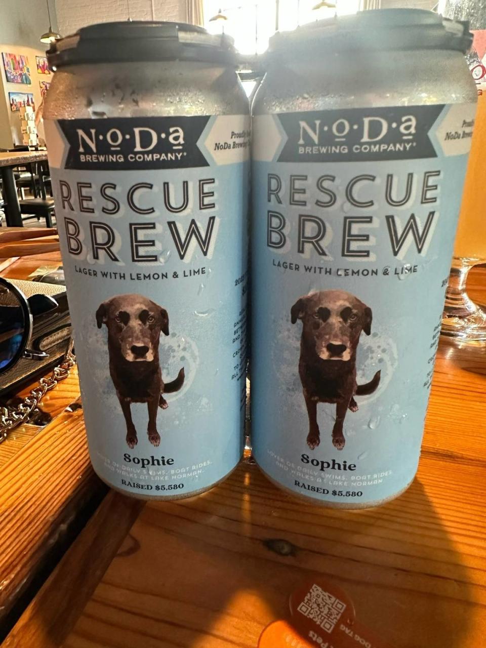 A drawing of Sophie adorns NoDa Brewing’s Rescue Brew beer can, and Cyndi Eller said she’s already bought a case of the beer.