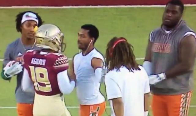 Watch This Florida State Kicker Get Punked By Miami Players For Warming ...