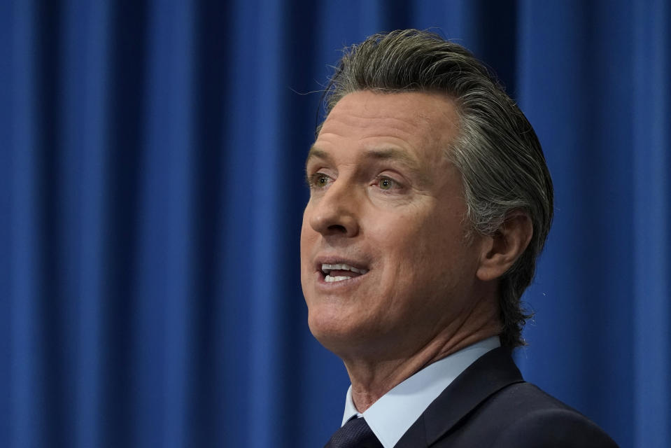 FILE - In this Jan. 8, 2021, file photo, California Gov. Gavin Newsom speaks during a news conference in Sacramento, Calif. Gov. Newsom could likely face a recall election this year. On Tuesday, Feb. 16, 2021, the California Legislature passed a bill that would require all active registered voters receive a ballot in the mail for that and any other election that happens this year. (AP Photo/Rich Pedroncelli, Pool, File)