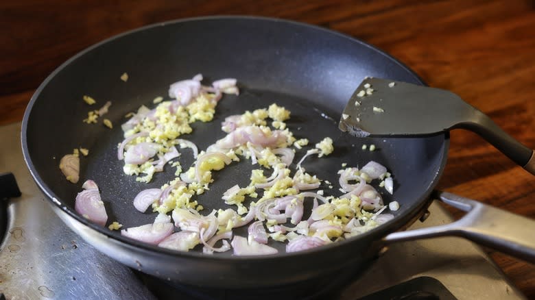 skillet of shallot, garlic, and ginger