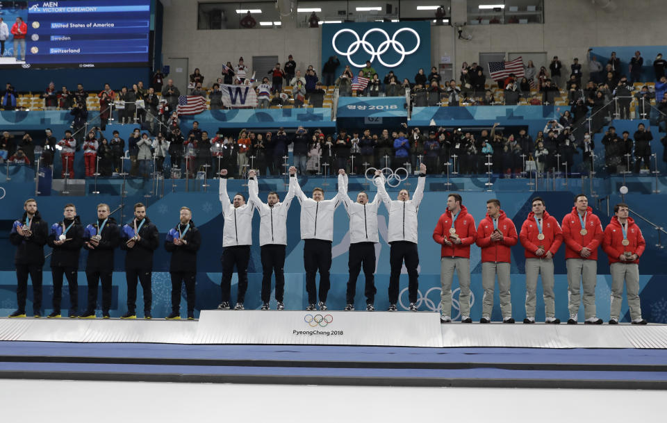 Team USA’s men’s curling team followed in “The Simpsons” footsteps and won the gold medal. (AP Photo)