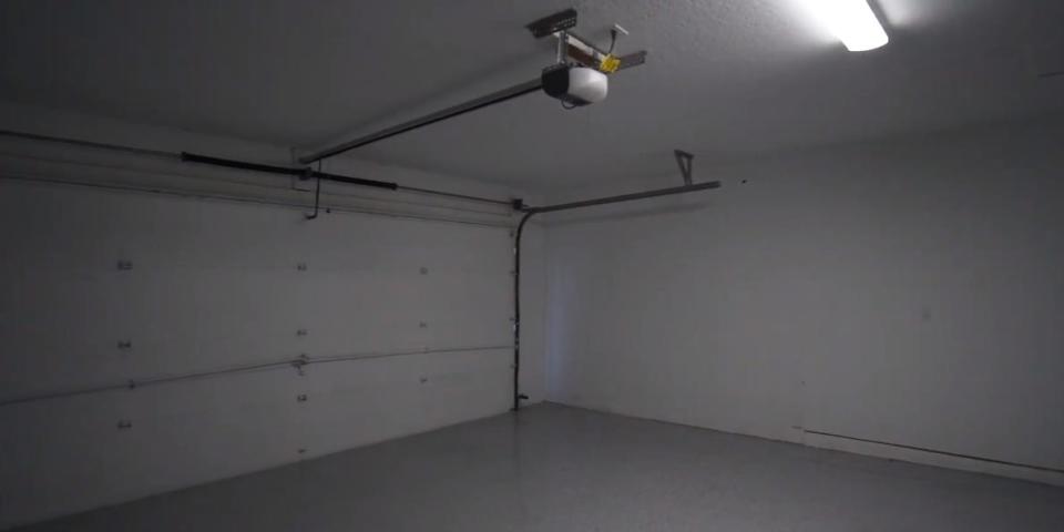 A clean and empty gray garage.