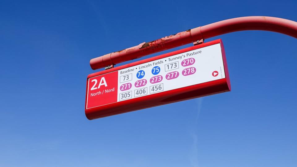 A bus sign showing routes with OC Transpo on March 25, 2024.